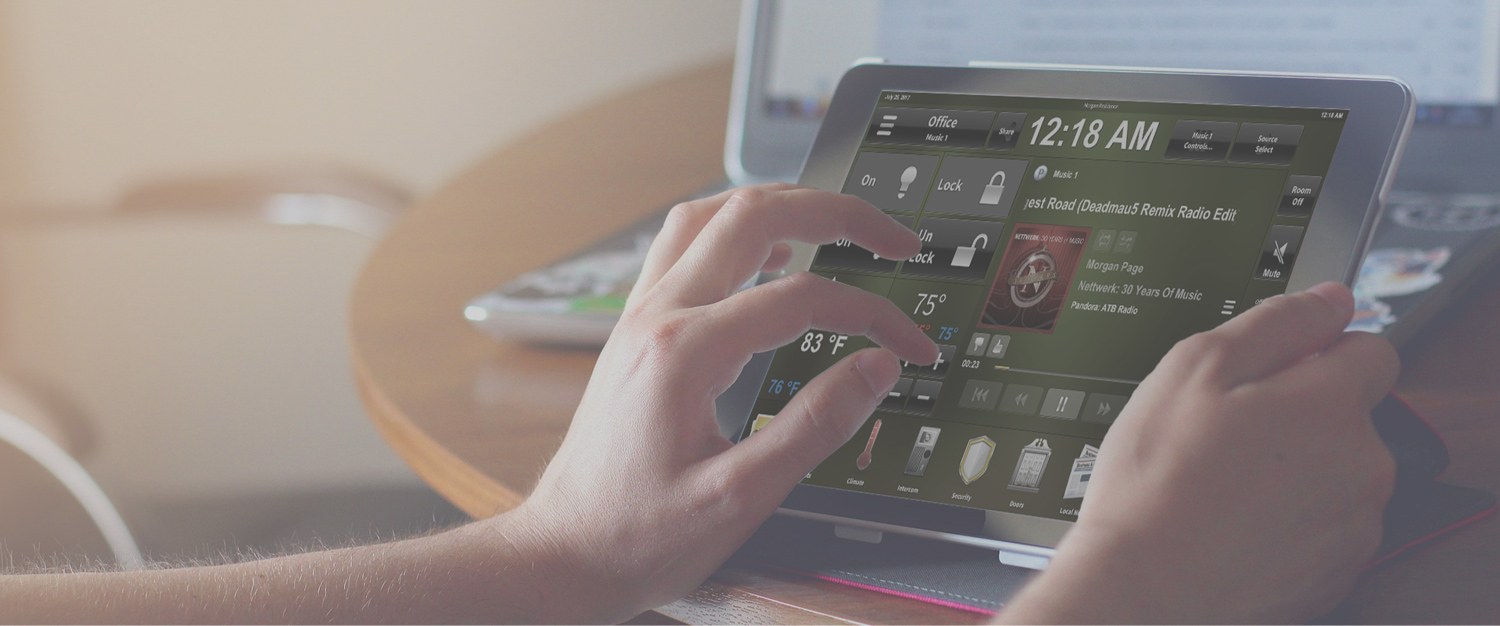 Woman using Adapt for Crestron on iPad