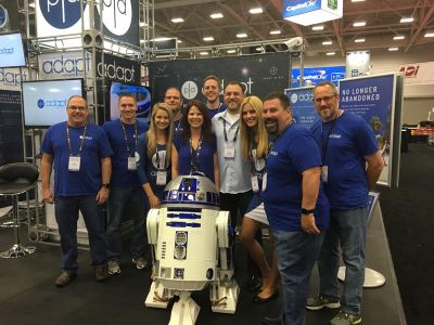 PanTech Design Adapt booth at CEDIA 2016, group photo with R2D2